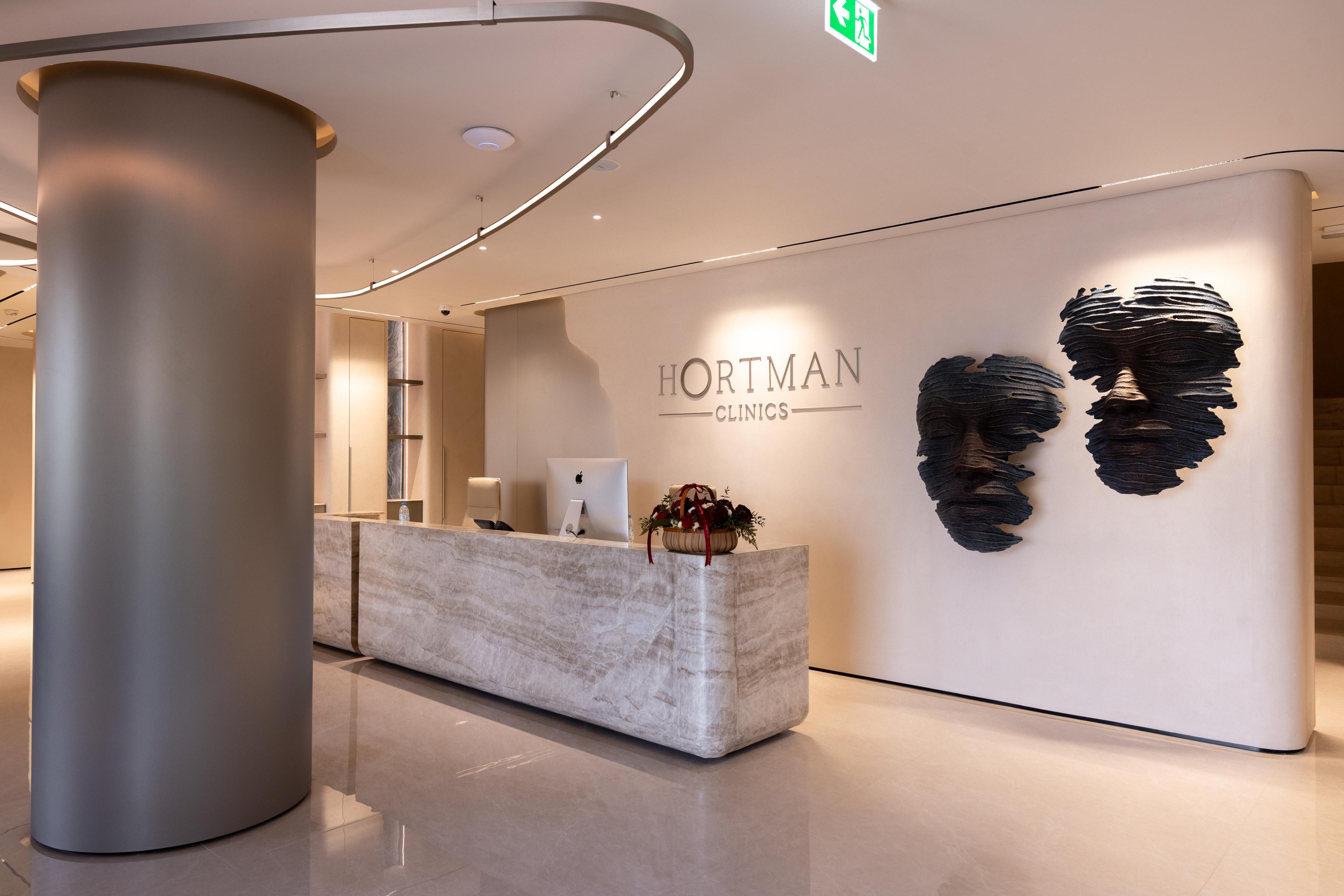 The lobby at Hortman Clinics Jumeirah 3, curved walls and warm light