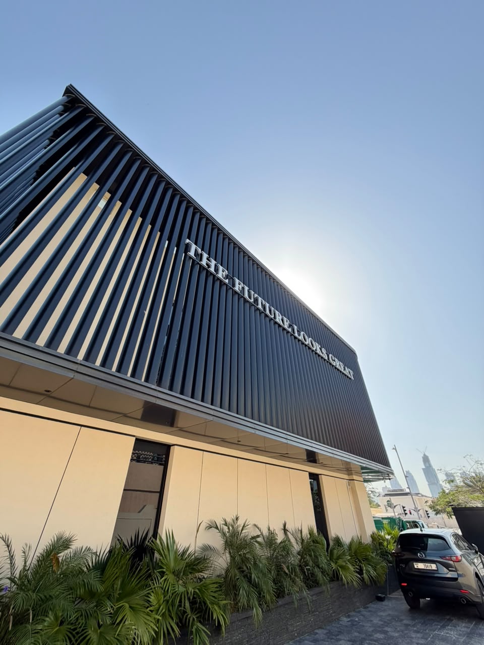 The words THE FUTURE LOOKS GREAT mounted in steel letters on the facade of Hortman Clinics in Jumeirah 3, Dubai